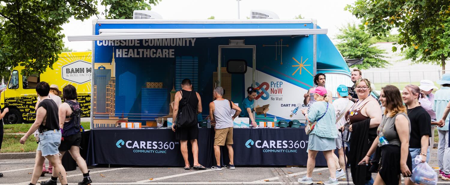 Cares 360 mobile Curbside Community Healthcare mobile clinic serves the community at an outdoor event. 